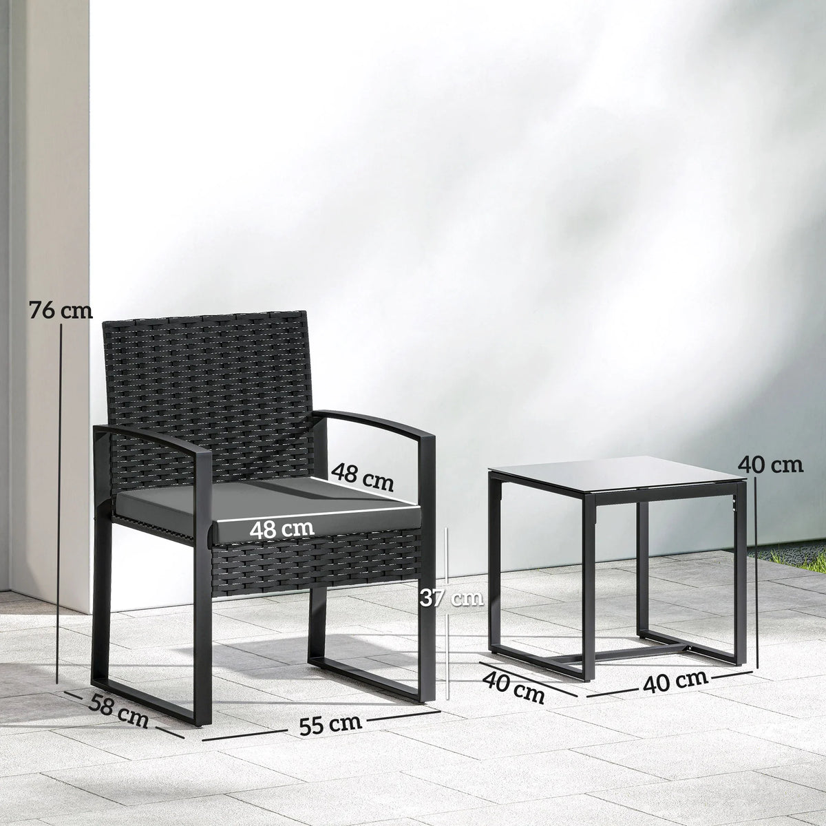 Dark grey 3-piece bistro set with two armchairs and glass-top table, measured view