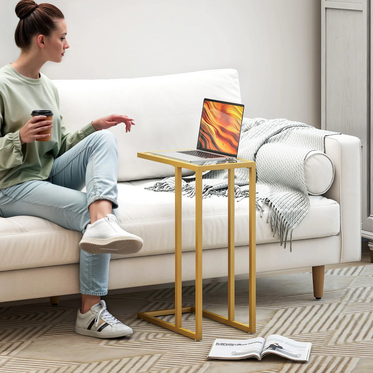 C-shaped side table with gold-tone frame and tempered glass top, slim end table