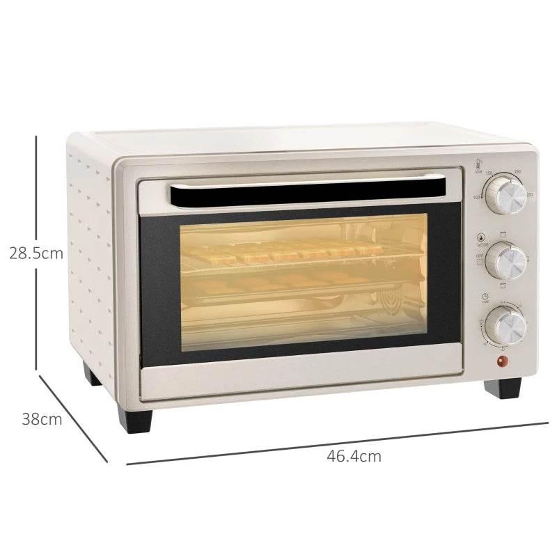Cream mini electric oven on four feet with side control knobs and glass door