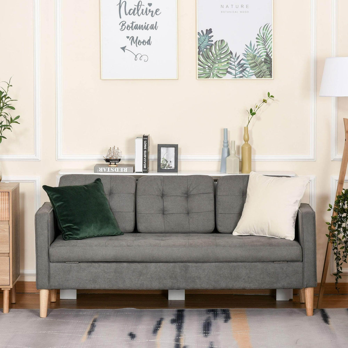 Grey 3-seat sofa with tufted seat cushions, fabric backrest, and wooden legs.