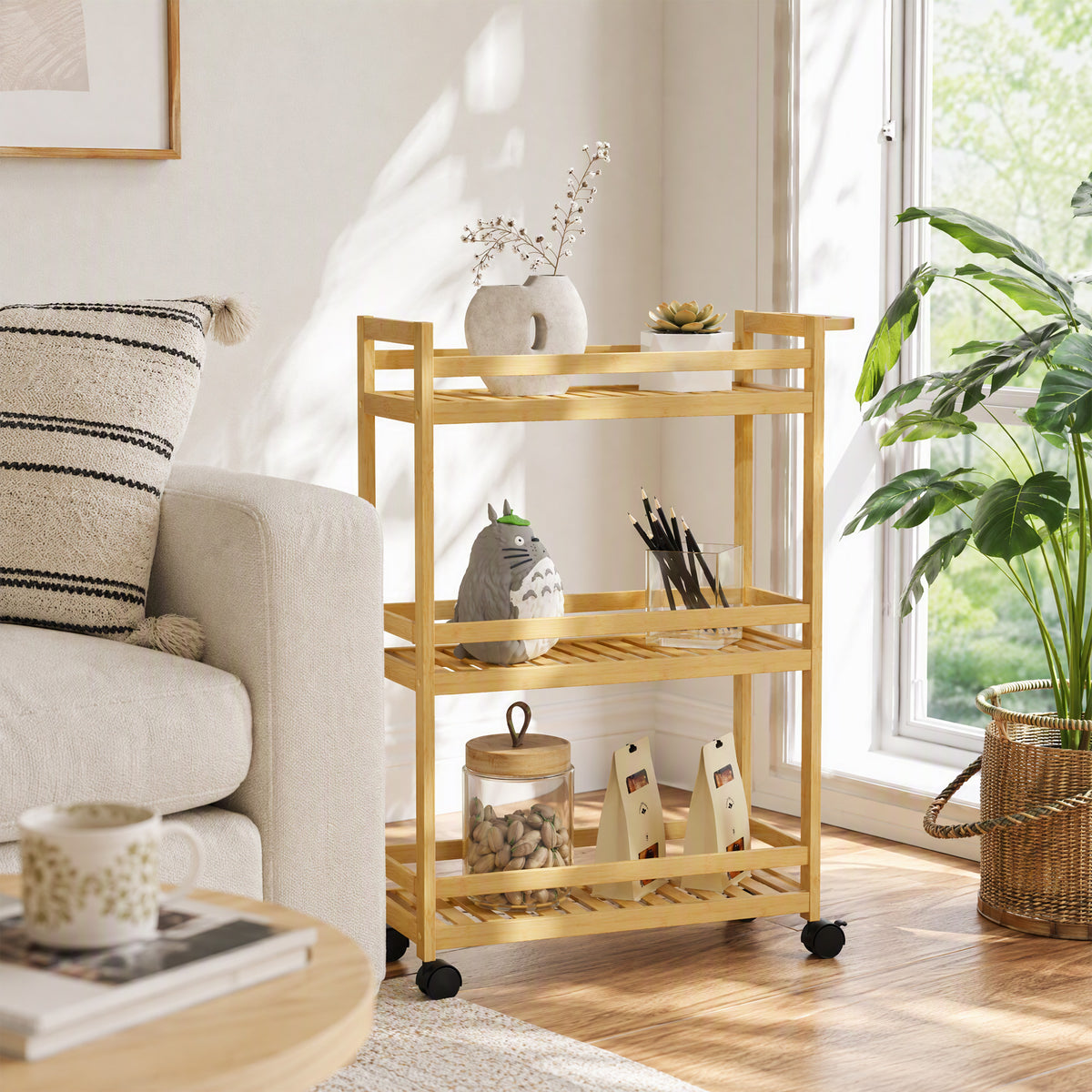 Bamboo 3-tier storage trolley with open shelves and caster wheels beside sofa