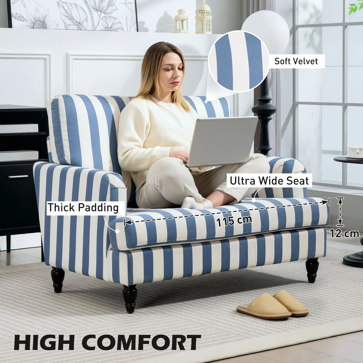 Blue and white striped velvet cuddle chair with wide seat, thick padding, turned legs