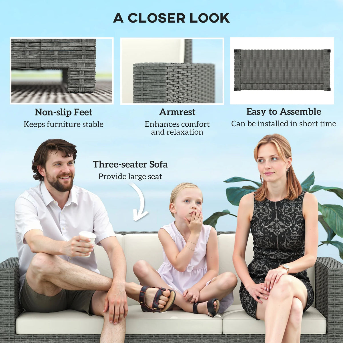Grey outdoor sofa with textured rattan weave, three-seat cushions, and armrests.
