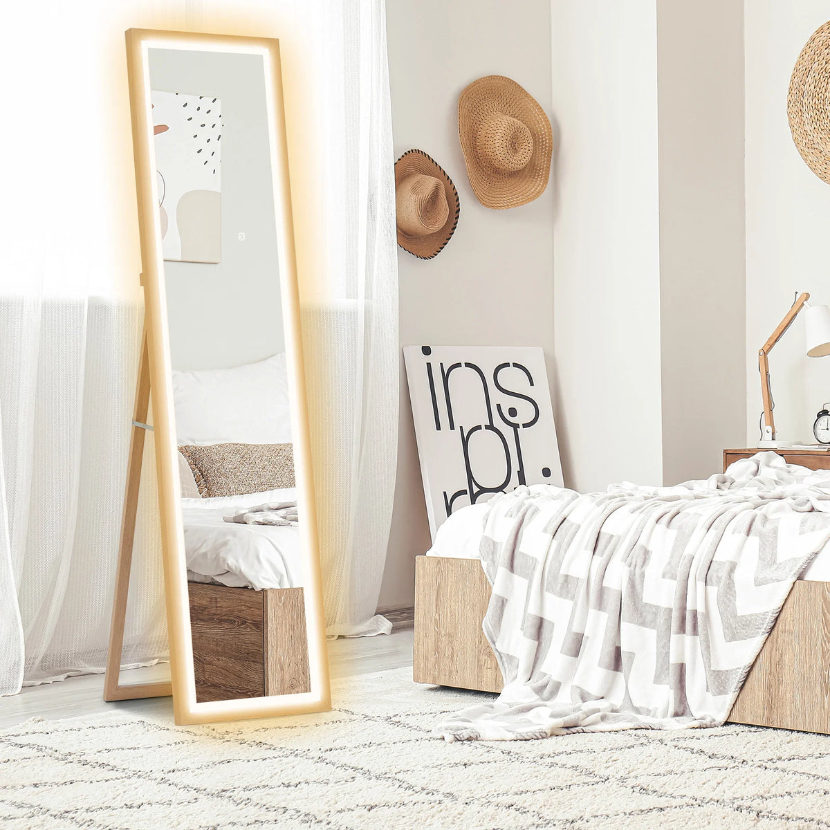Full-length LED mirror with slim oak frame and bright glowing border, standing on floor