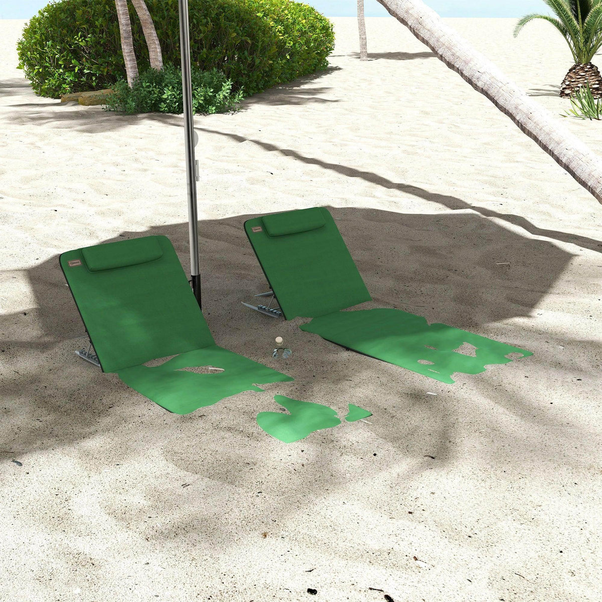 Green outdoor reclining chair with matching pillow, metal frame, on sandy beach