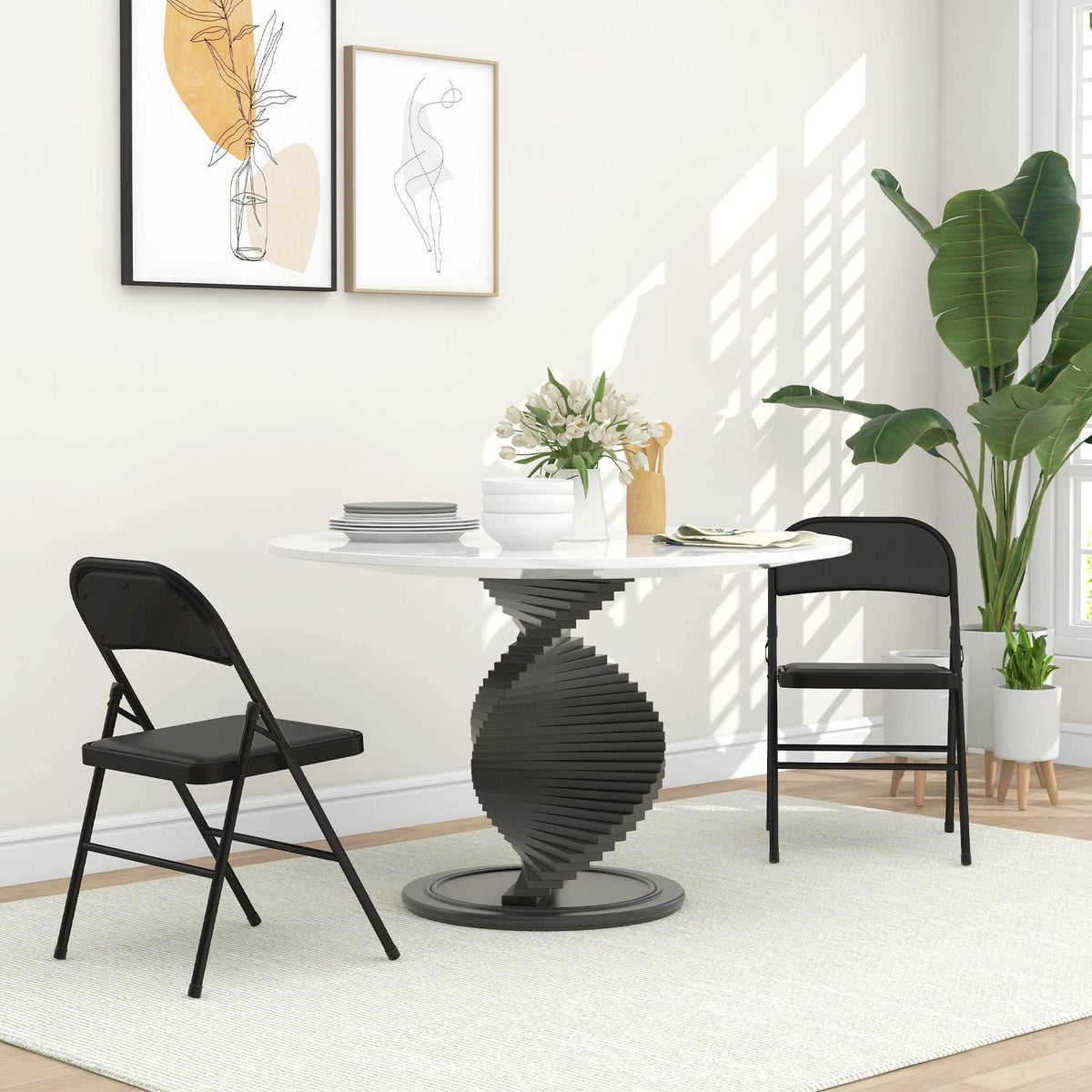 Set of 2 padded folding chairs with black PU leather seats and backs, steel frame