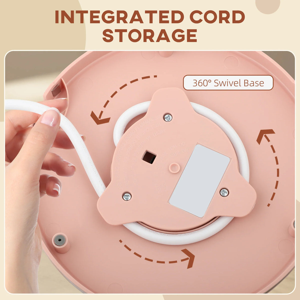 Light pink electric kettle with integrated cord storage on the 360° swivel base