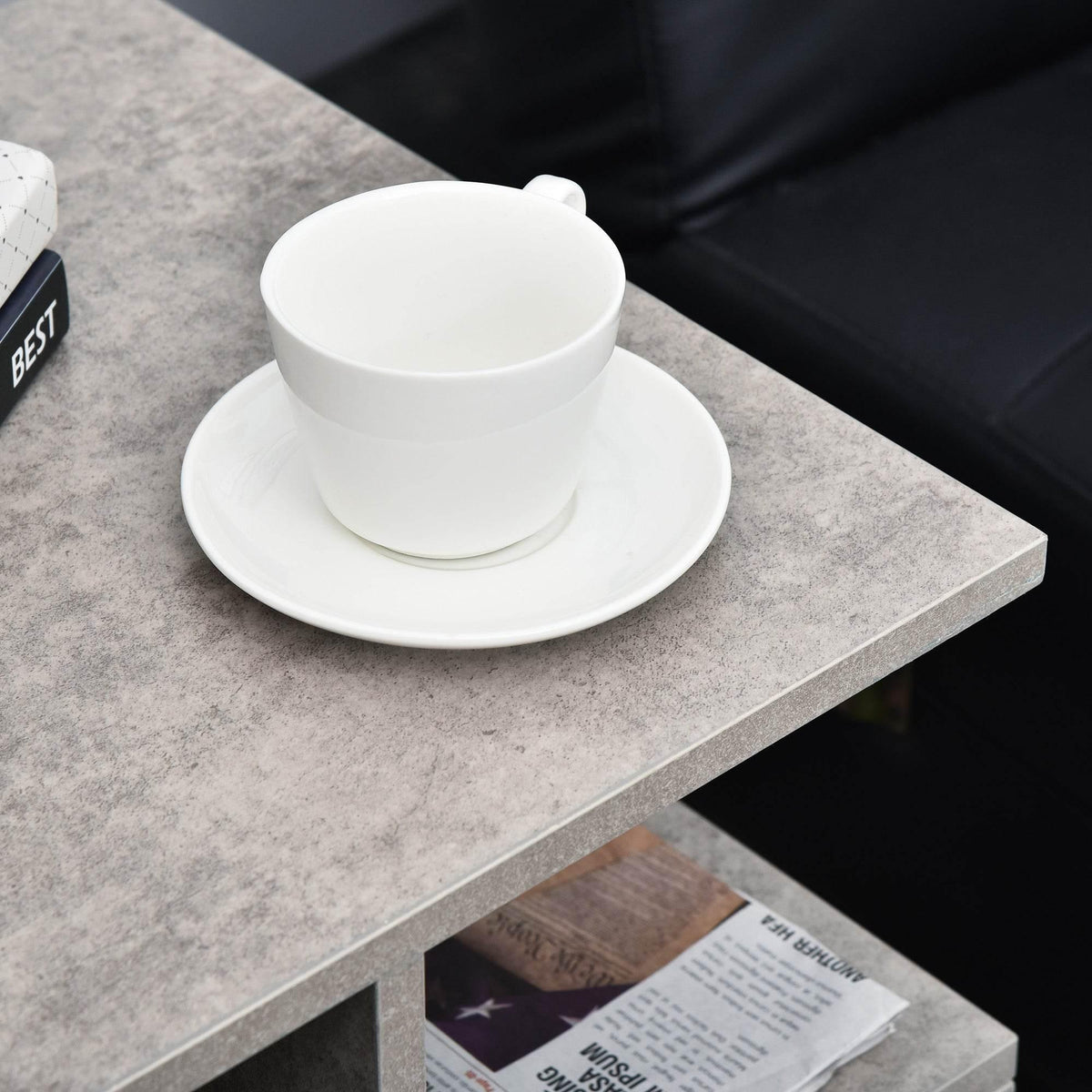 Gray cement-finish side table with open shelf beneath tabletop