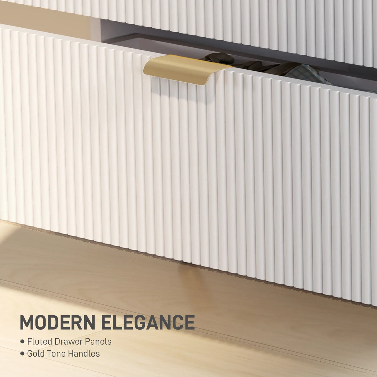 White fluted drawer front with gold bar handle detail