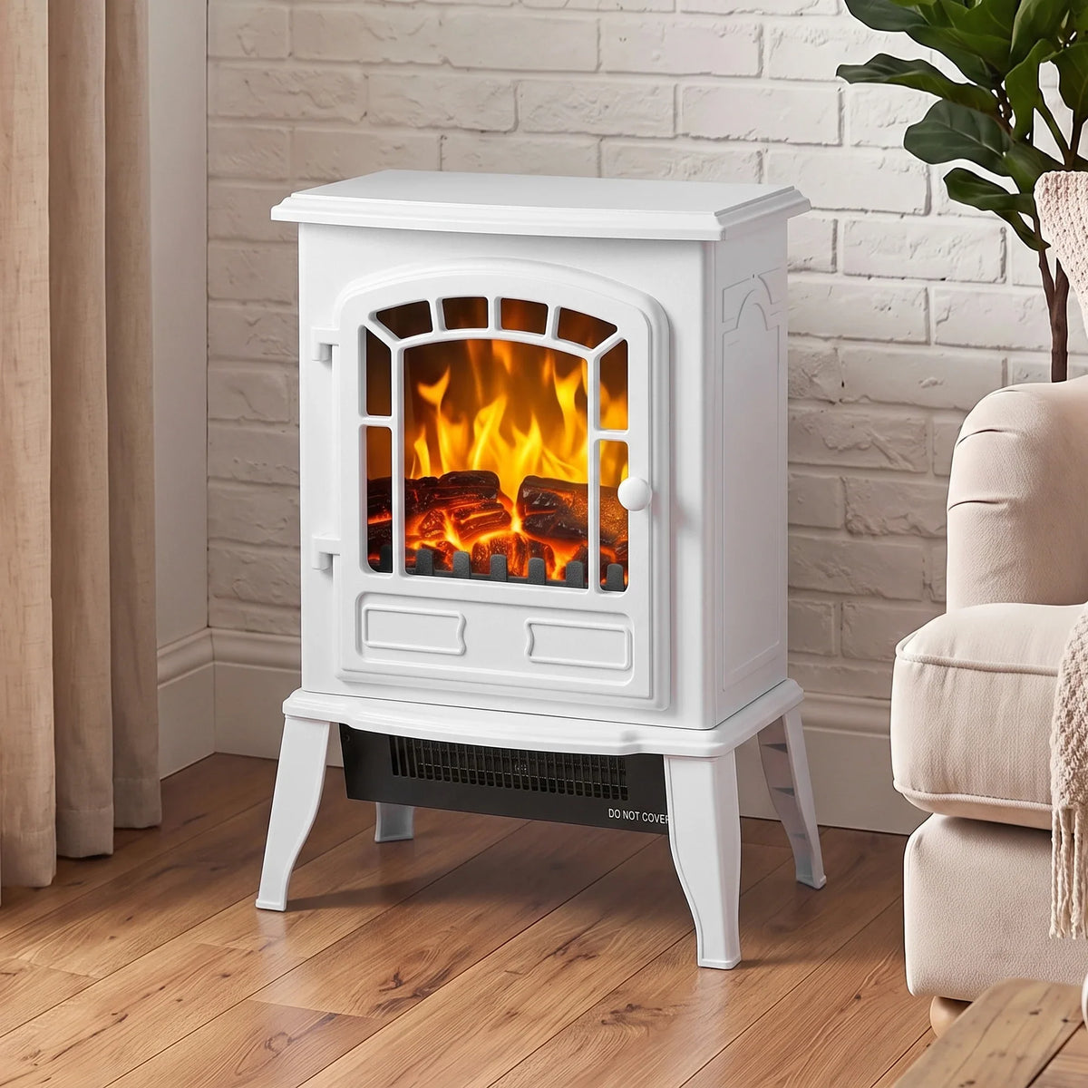 White freestanding electric fireplace with arched front window and orange flame effect