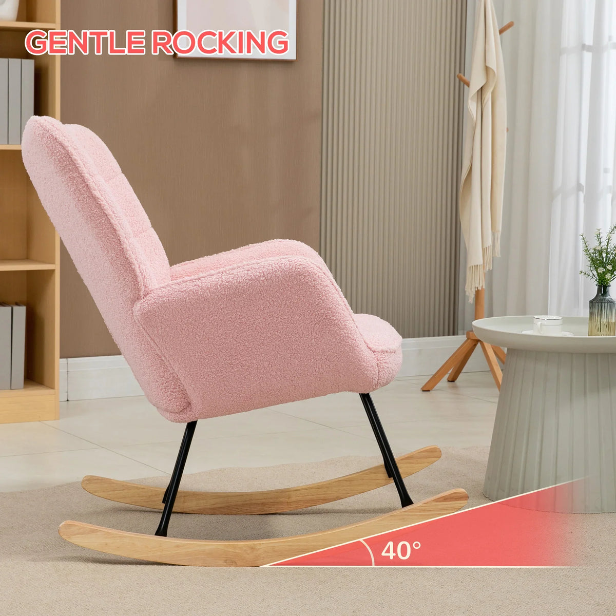 Pink plush wingback rocking chair with padded arms and curved wooden rockers