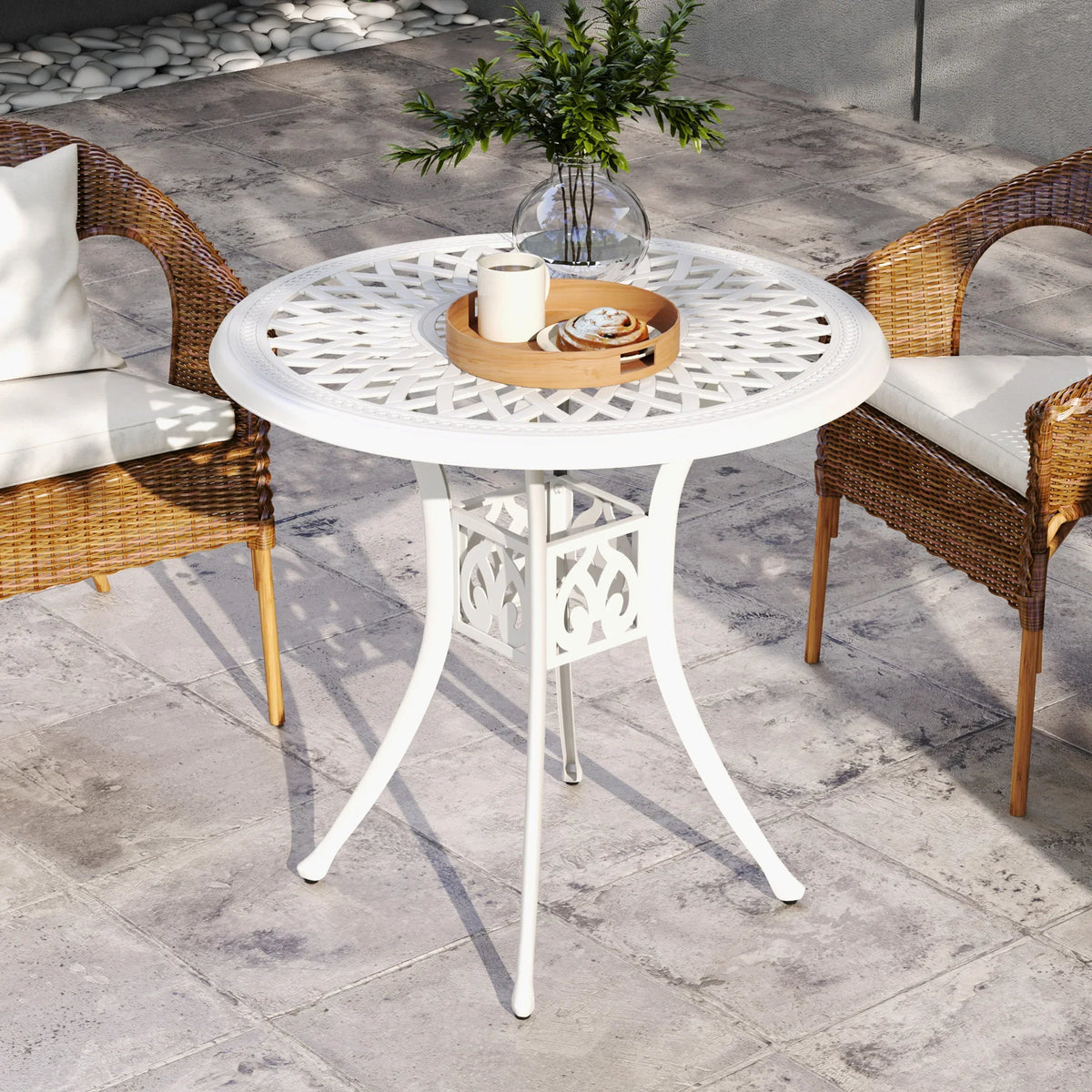 White round garden table with decorative cutout pattern and umbrella-hole center