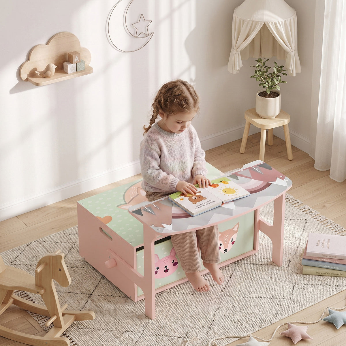 Pink kids table and storage bench with animal print panels and toy bins