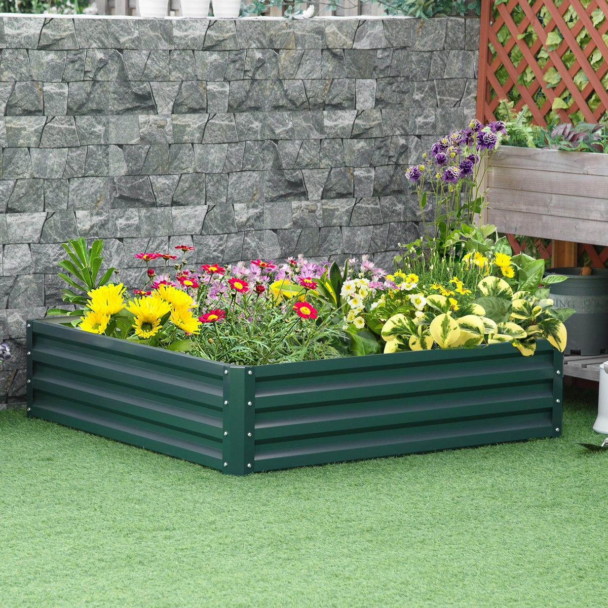 Green metal raised garden bed planter with slatted sides and open-top frame