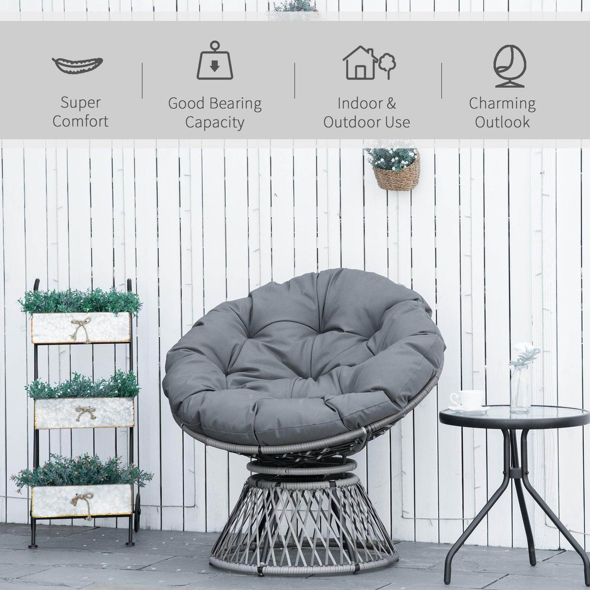 Outdoor-ready papasan swivel rattan chair with gray padded cushion and round woven base