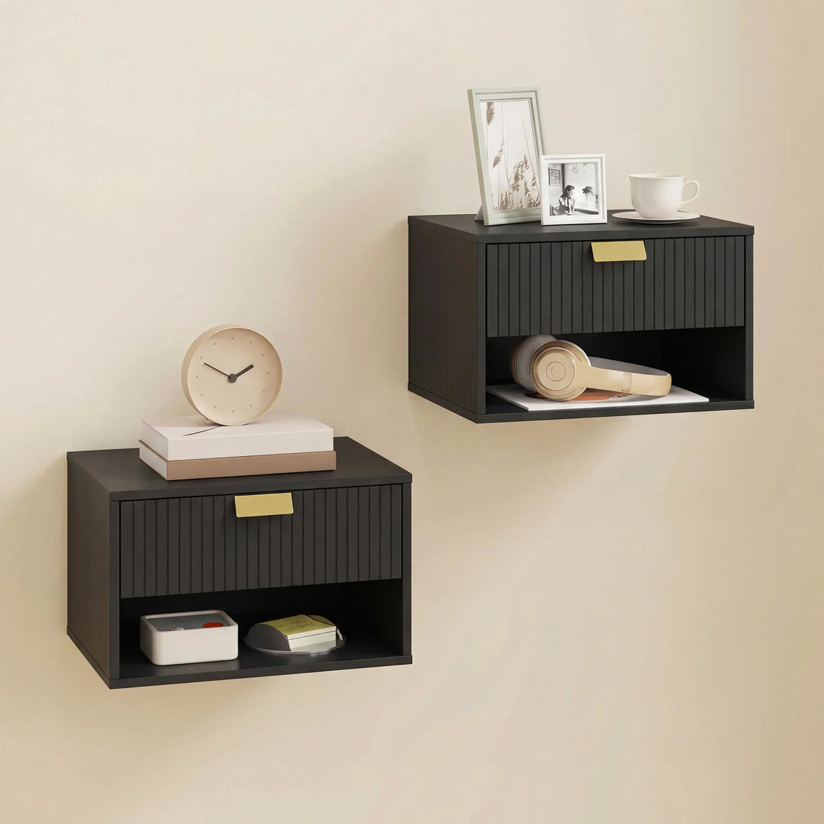 Wall-mounted black nightstand set with fluted drawer fronts and open storage shelf