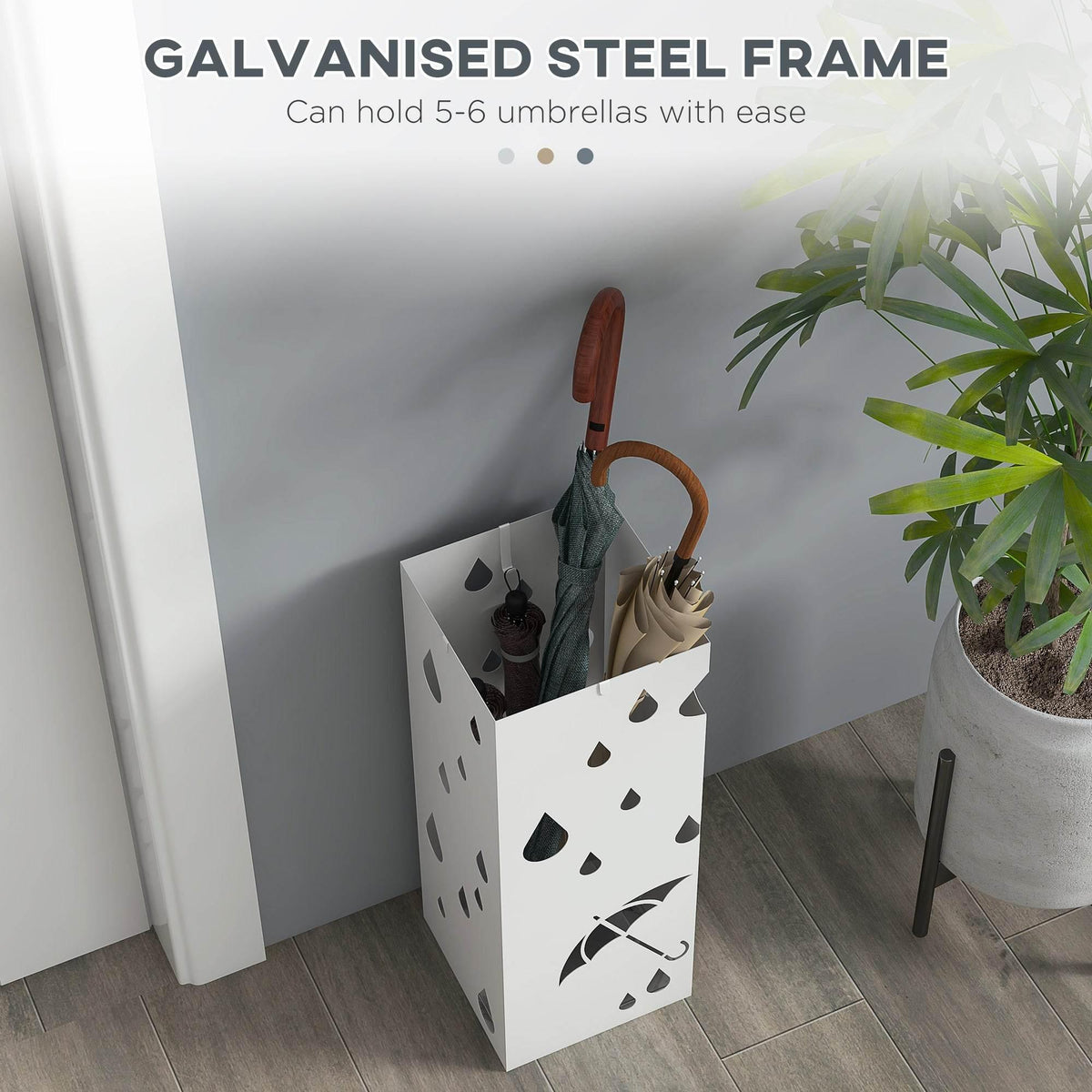 White steel umbrella holder stand with raindrop pattern, holding umbrellas