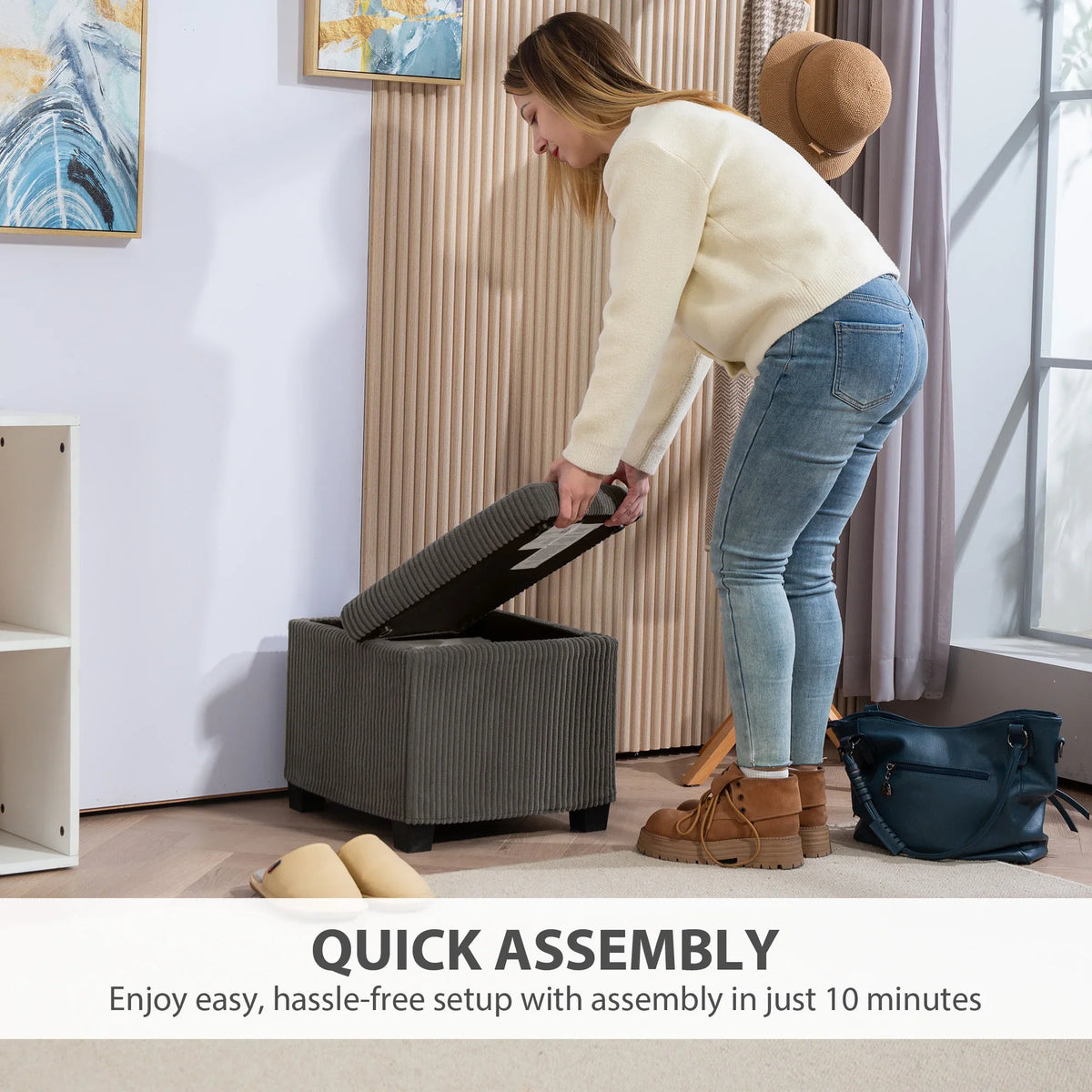 Grey corduroy storage ottoman bench with hinged lid open, showing access to storage.