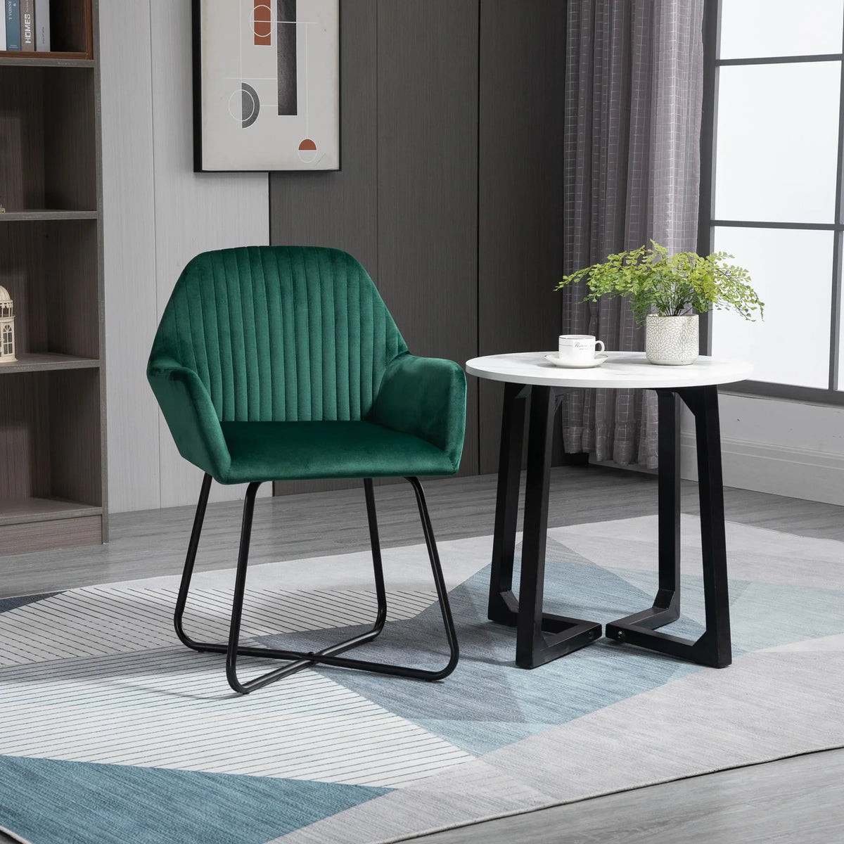 Green upholstered arm chair with black metal curved base and vertical channel back