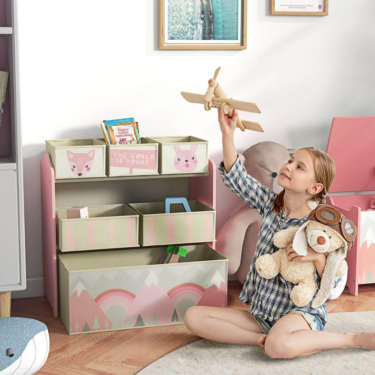 Kids storage shelf in pink with six fabric bins and cute animal-face designs