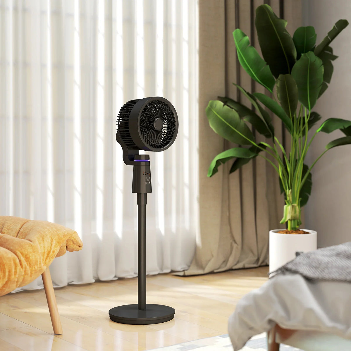 Black pedestal fan standing on a round base near sheer curtains and a plant pot