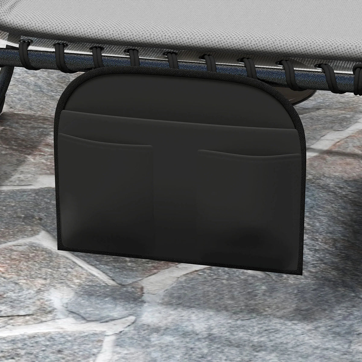 Close-up of black storage pocket on light grey reclining sun lounger base