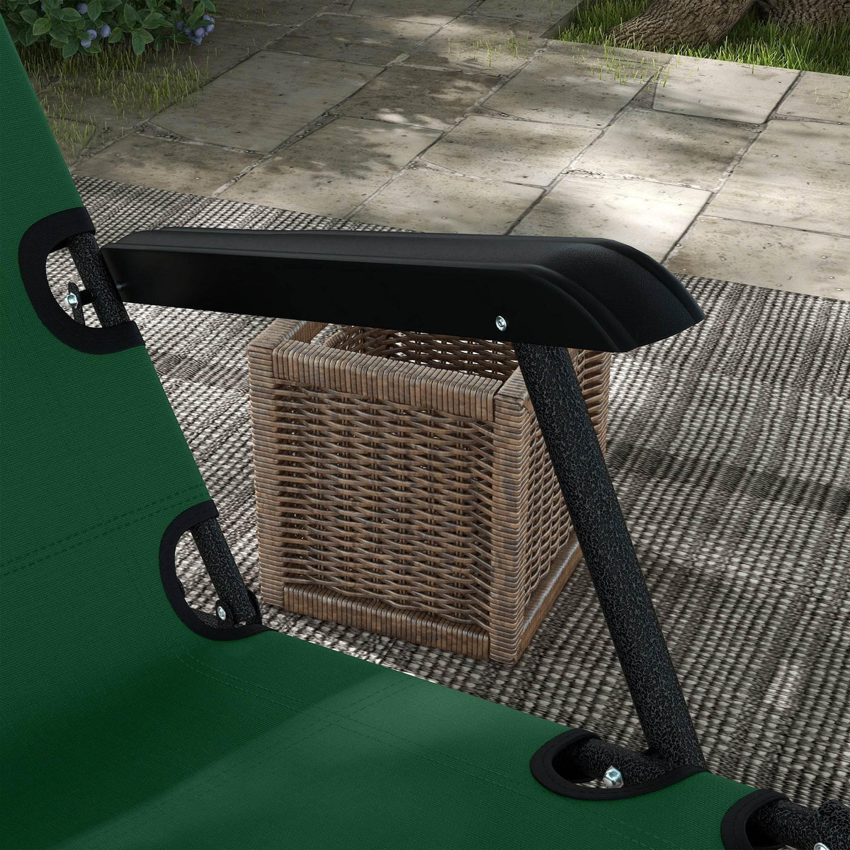 Green sun lounger chair arm and leg detail with black steel frame and rounded rubber caps