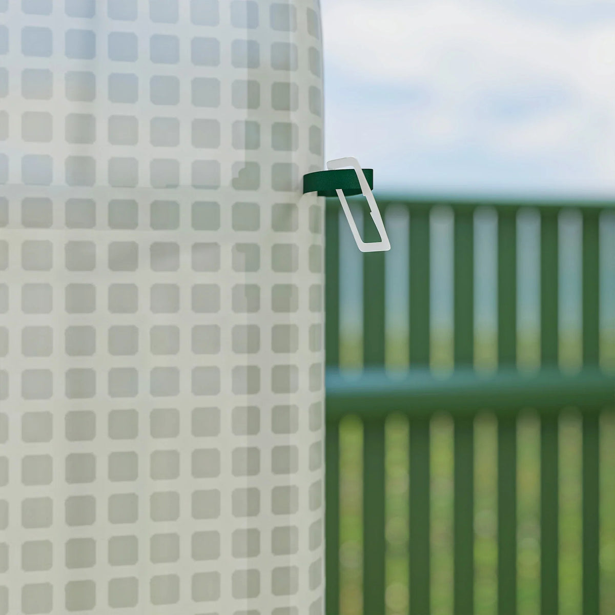 White greenhouse cover clip on metal frame post