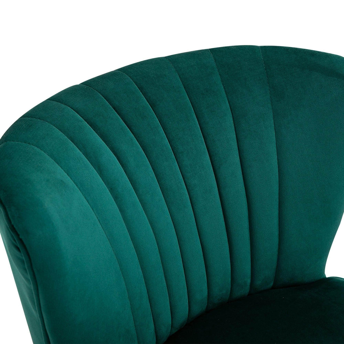 Close-up of green velvet channel tufting on the tub chair back
