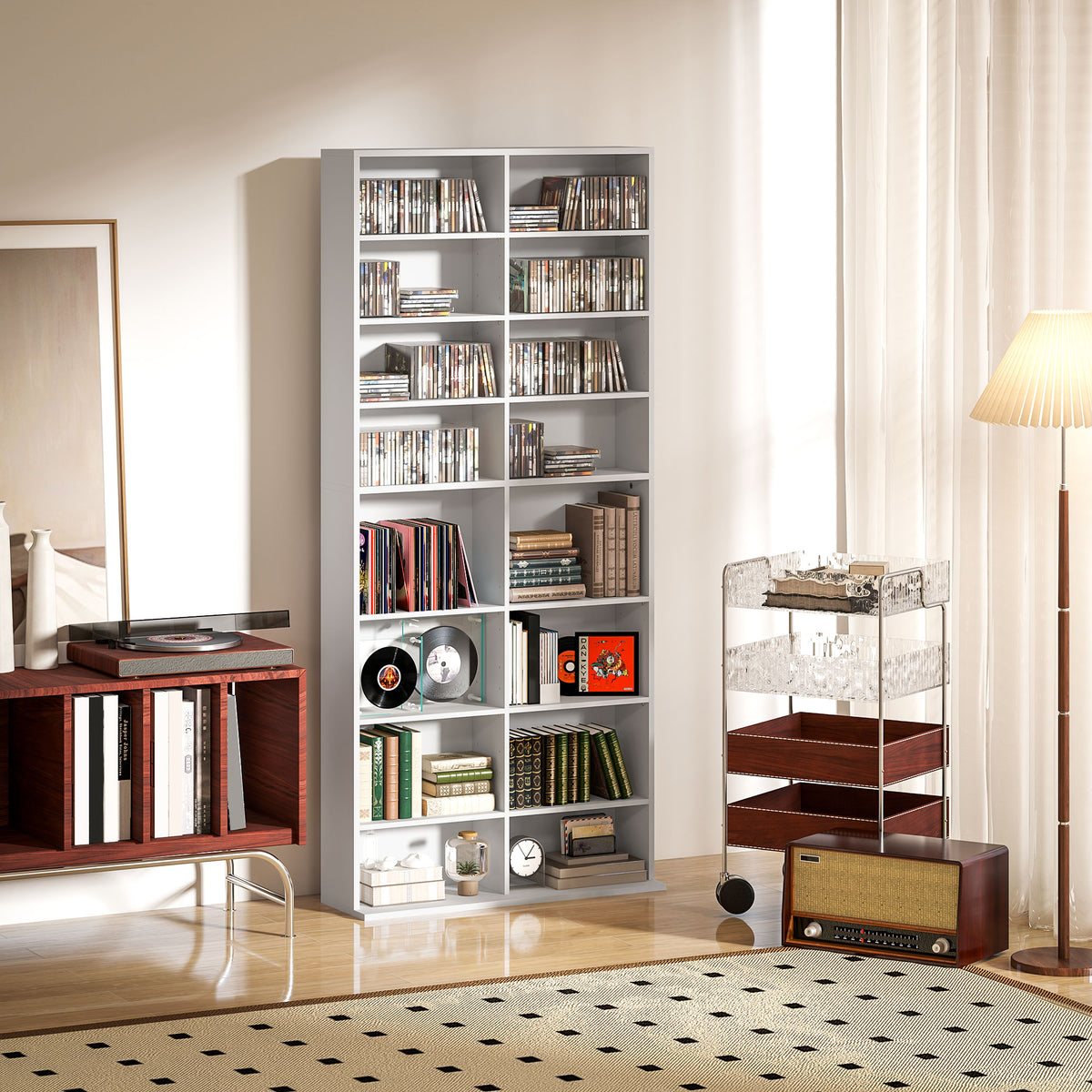 White media storage tower with multiple open shelves for CDs and DVDs