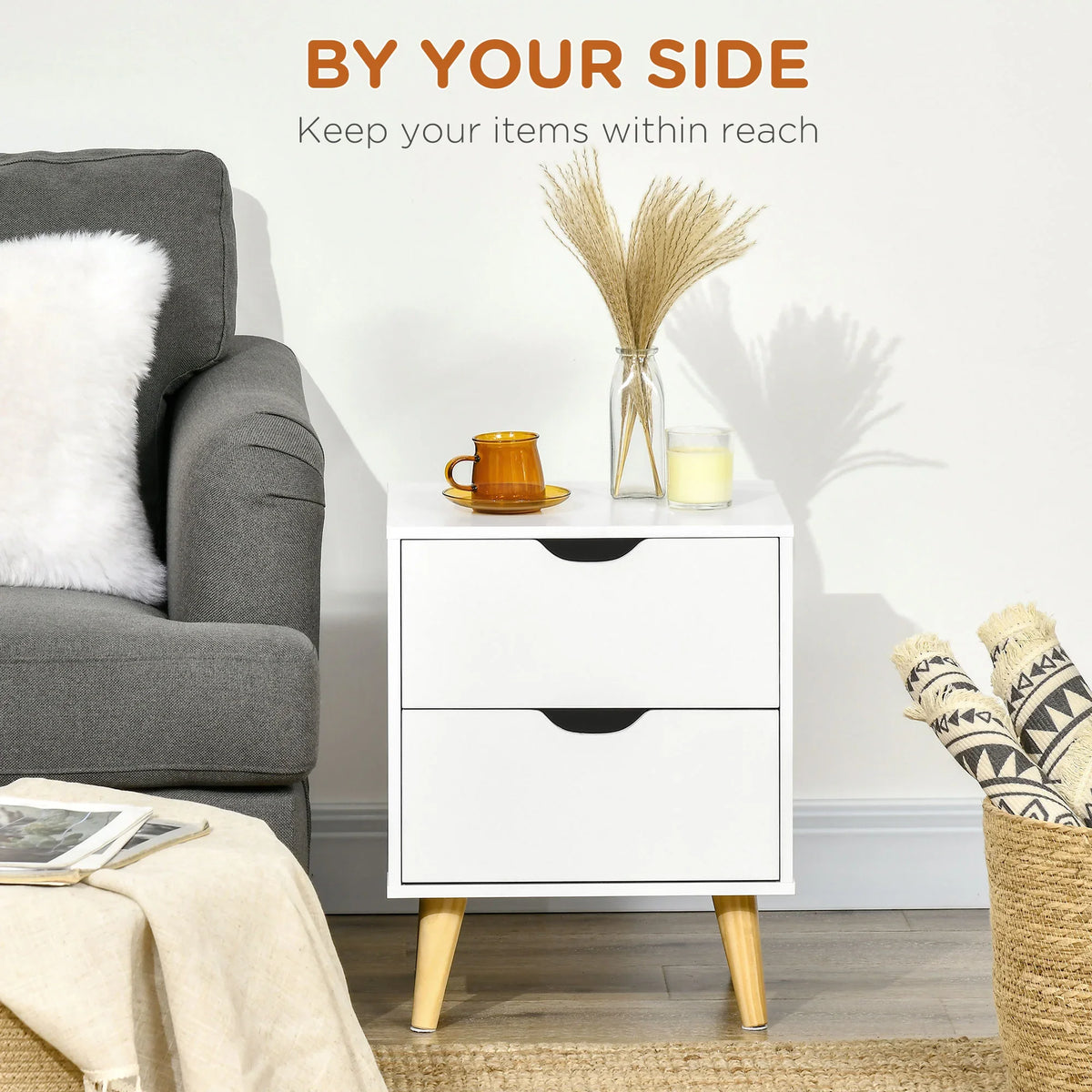 White two-drawer nightstand with black curved handles and light pine legs.