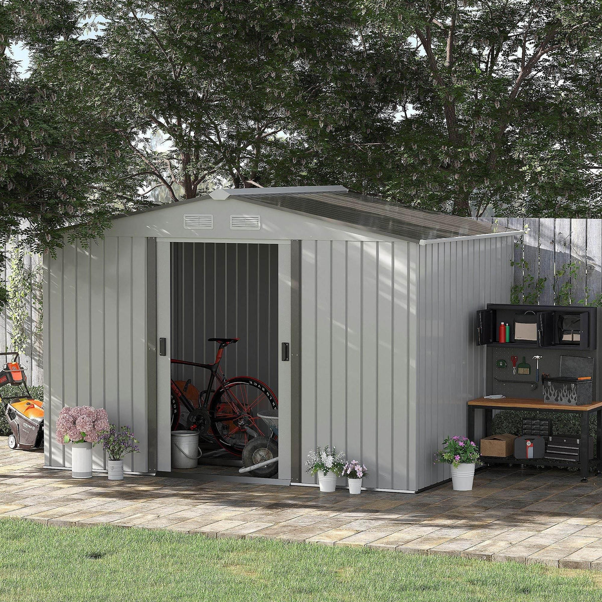 Grey metal garden storage shed with double sliding doors, open entrance, and interior storage