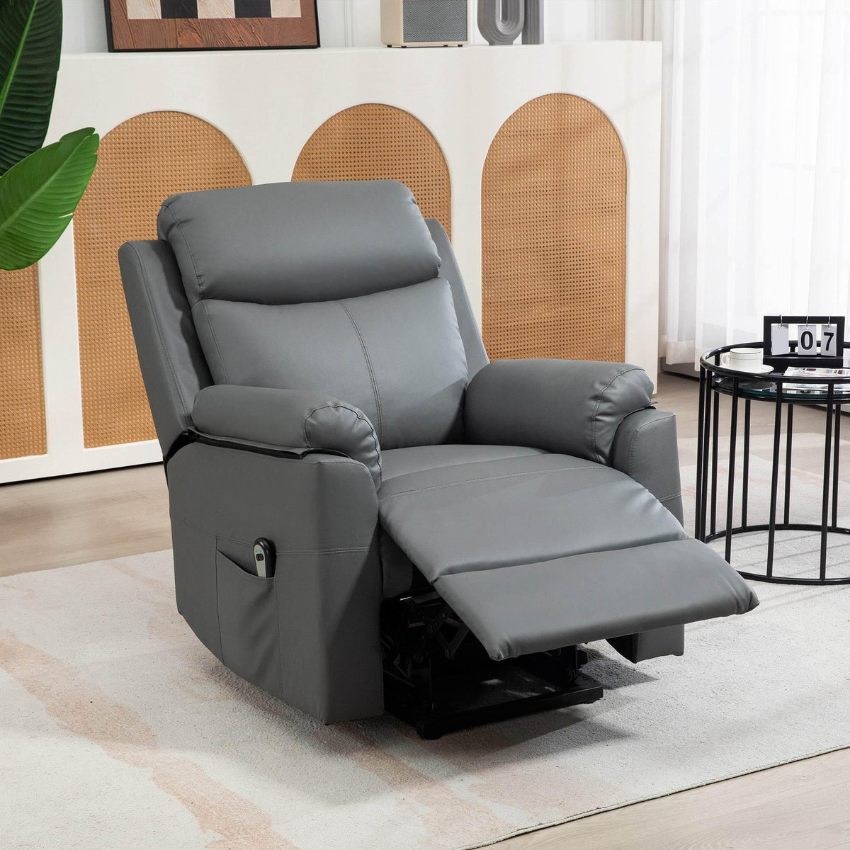 Charcoal grey electric lift recliner chair reclined with footrest extended