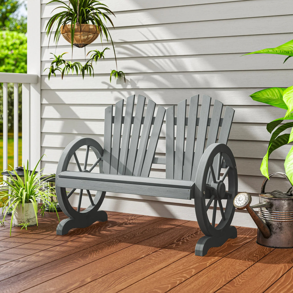 Grey two-seat fir wood outdoor bench with slatted back, wagon wheel armrests
