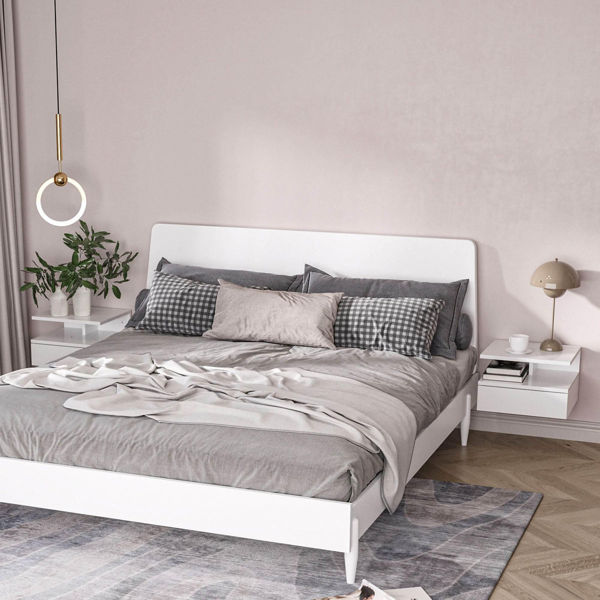 Two white floating nightstands with open shelf and drawer, styled with lamps by a bed