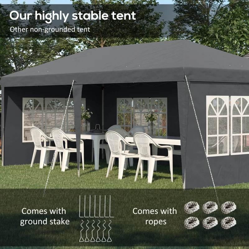 Grey pop-up gazebo with sidewalls, open front, ropes, and window print panels