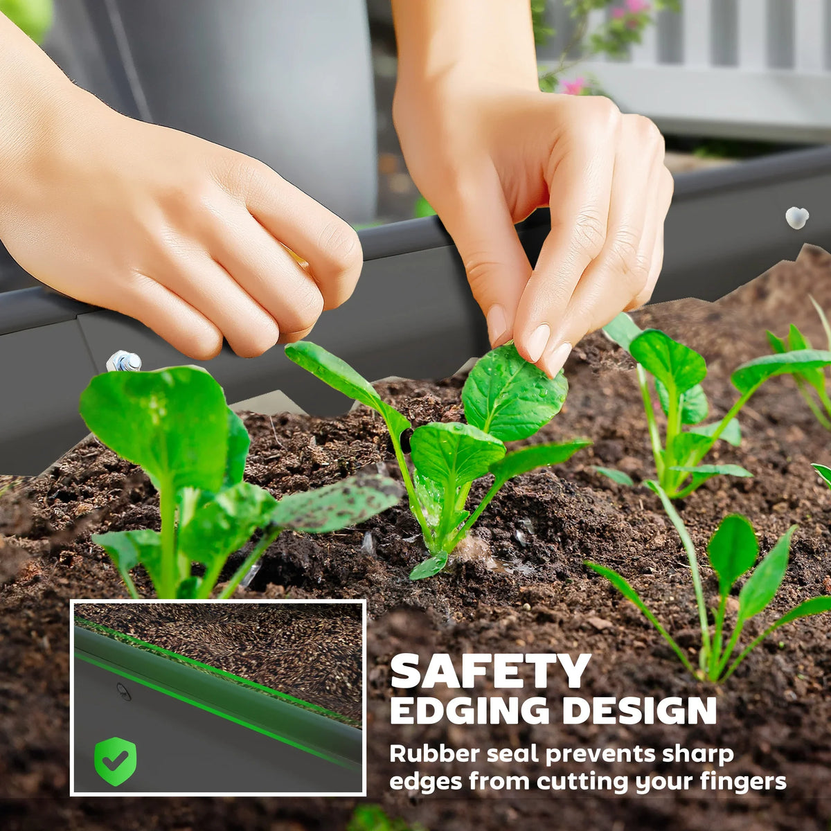 Dark grey raised bed planter with soil and seedlings, hands planting