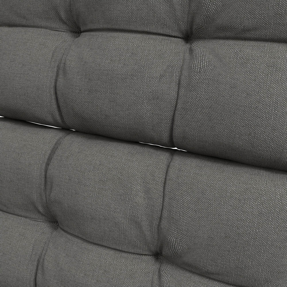 Charcoal grey tufted cushion surface with stitched seams and padded backrest panels