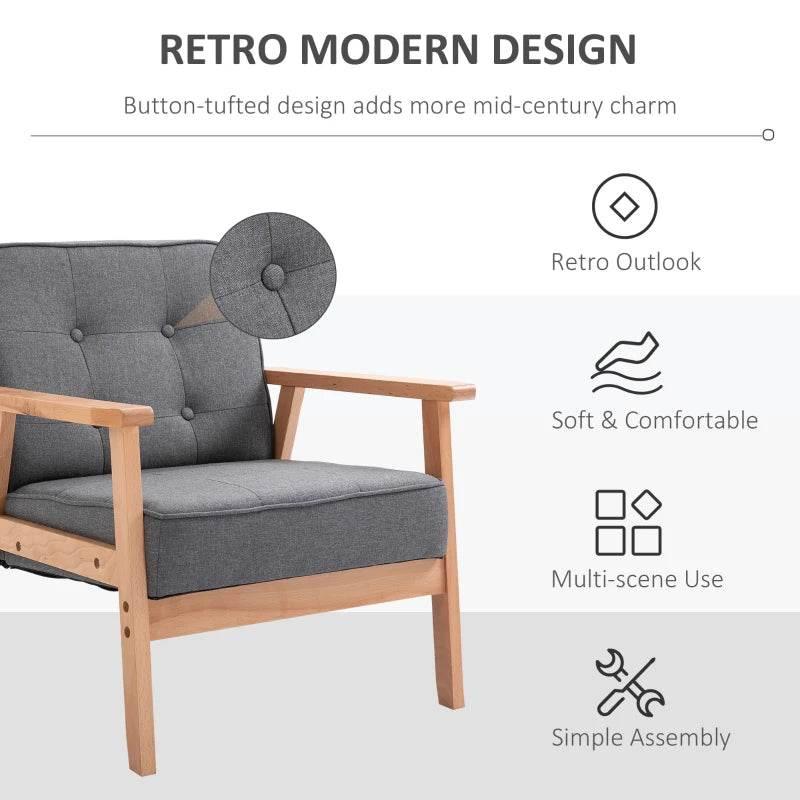 Grey tufted accent chair backrest with round button details and beech wood arms.
