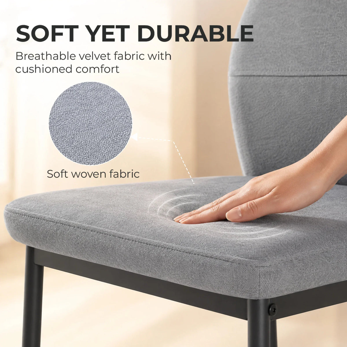 Grey velvet bar stool seat with cushioned upholstery and curved backrest