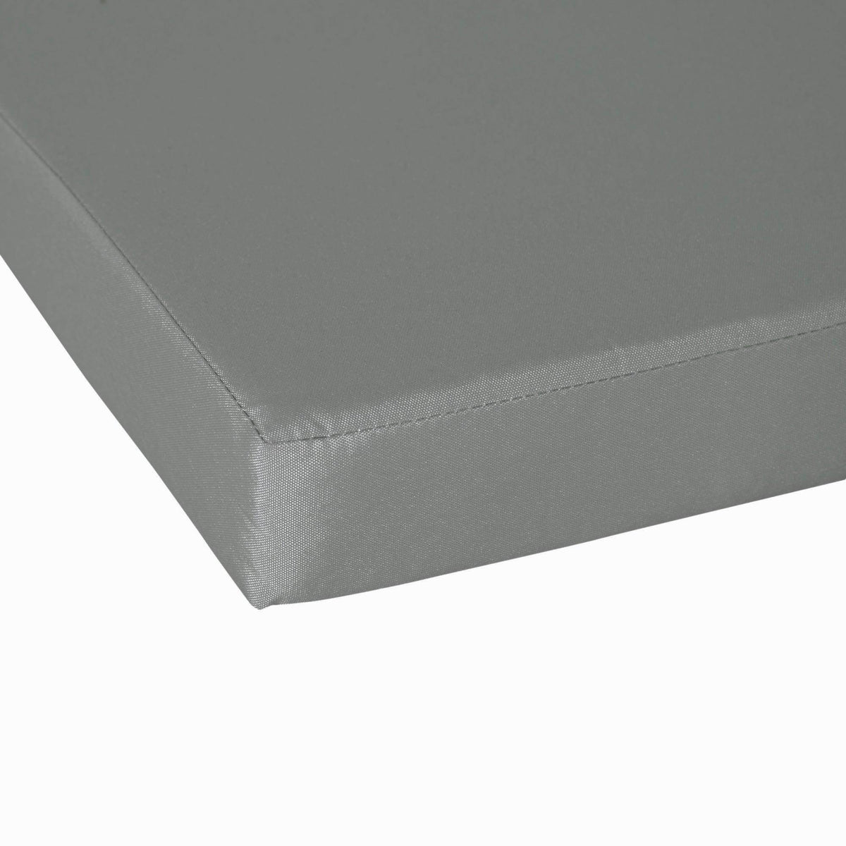 Dark grey cushion corner with stitched edge and smooth fabric surface