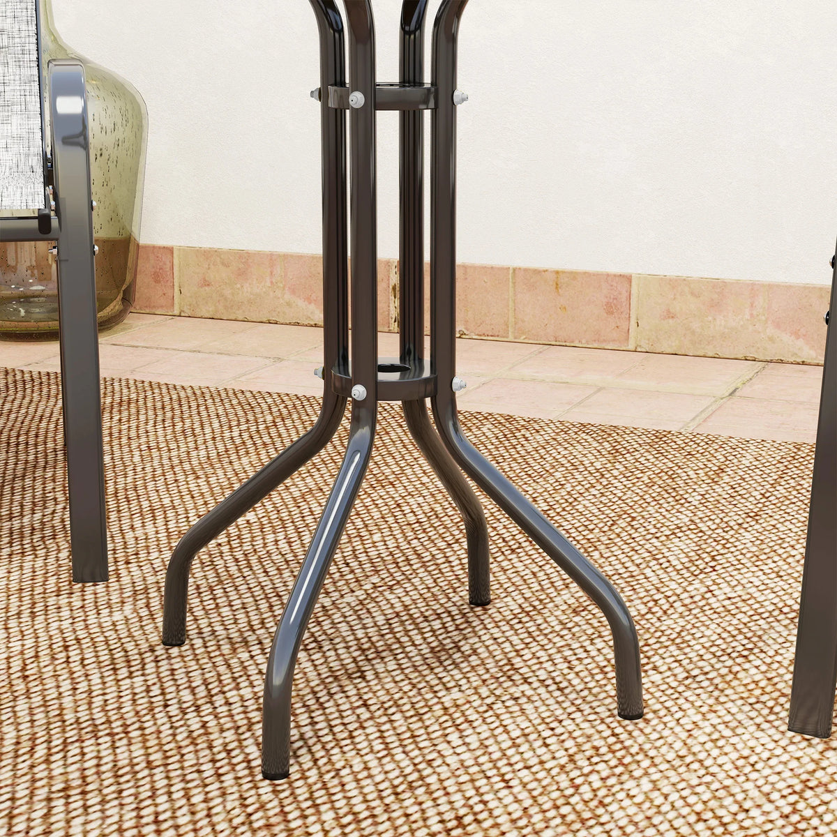 Round table base with three-prong metal legs and protective feet