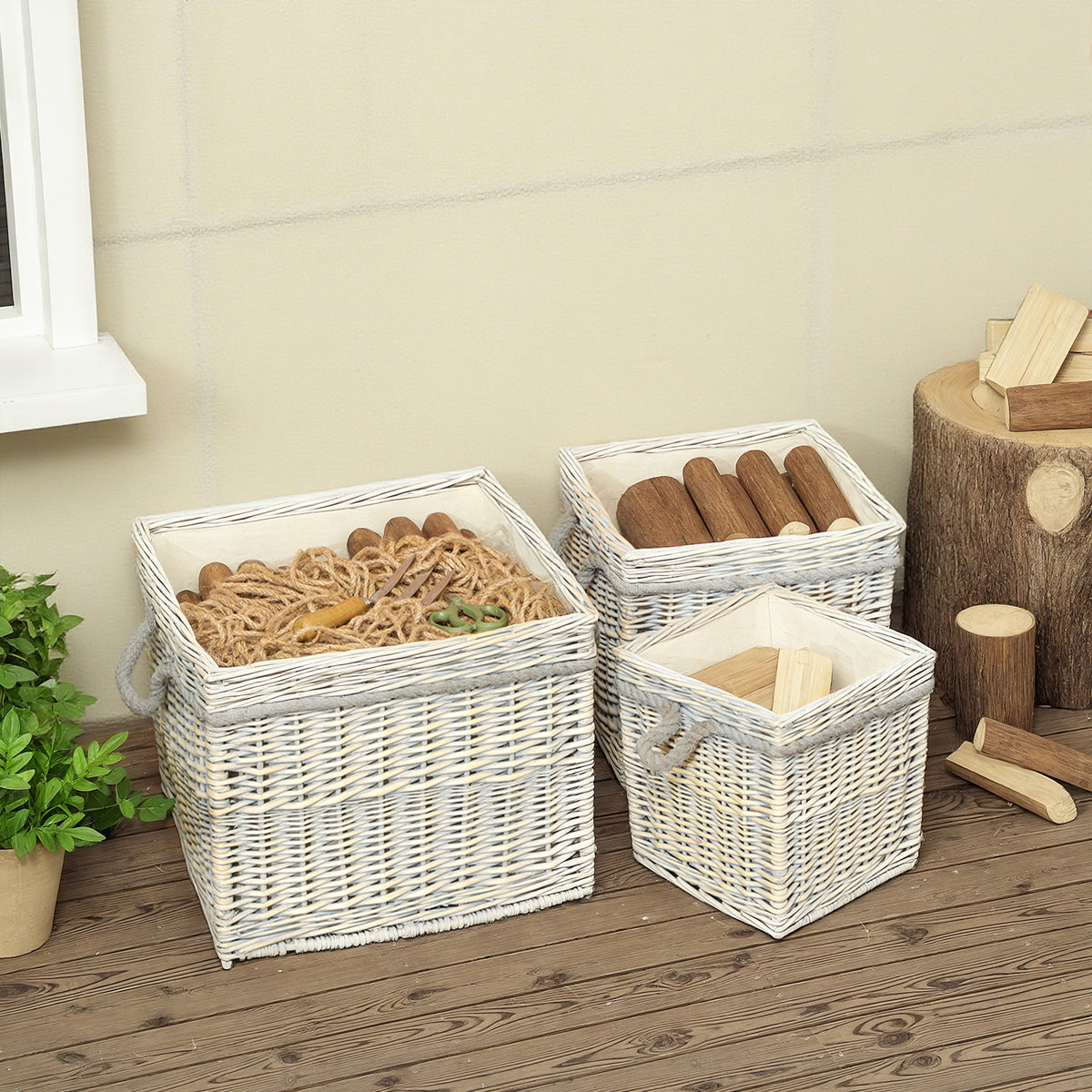 Set of 3 wicker log baskets with rope handles for indoor firewood storage