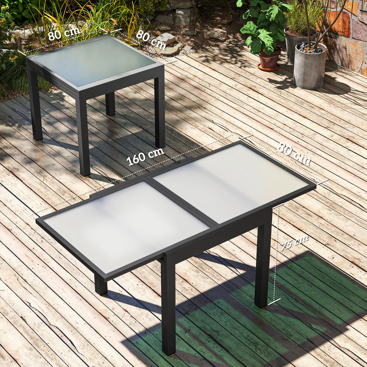 Outdoor extending garden table with two clear glass panels on a black frame, corner layout
