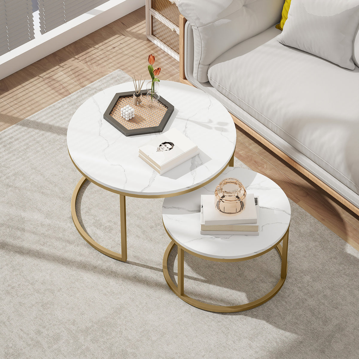 Nested round coffee tables with marble-look tops and gold steel frames