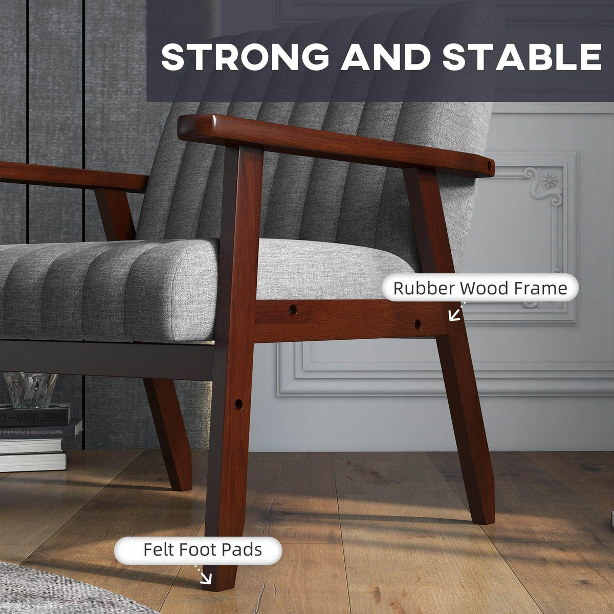 Grey armchair with dark wood frame, felt foot pads, and padded seat cushion
