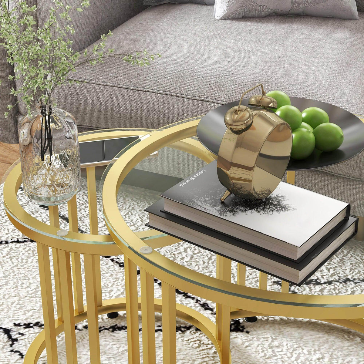 Gold round coffee table with clear tempered glass top and curved support bars
