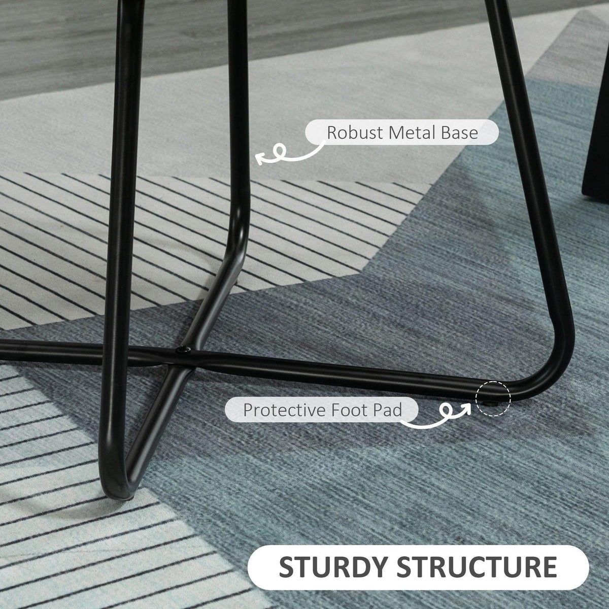 Grey chair base with black metal sled legs and protective foot pads