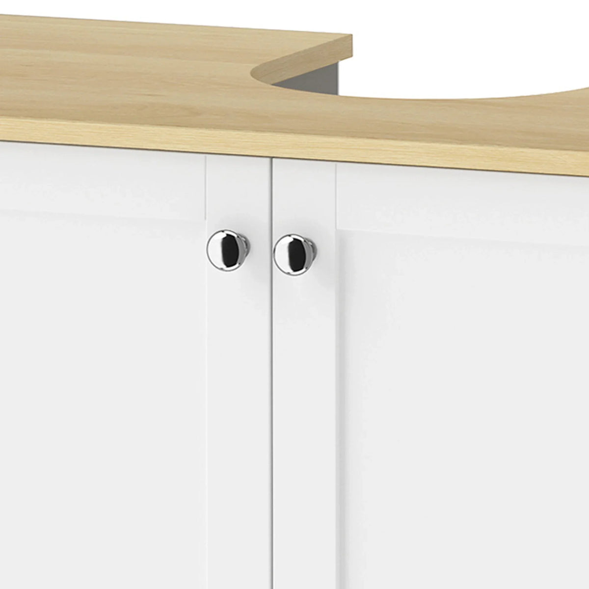 White cabinet doors with silver-tone round knobs under a light wood top.