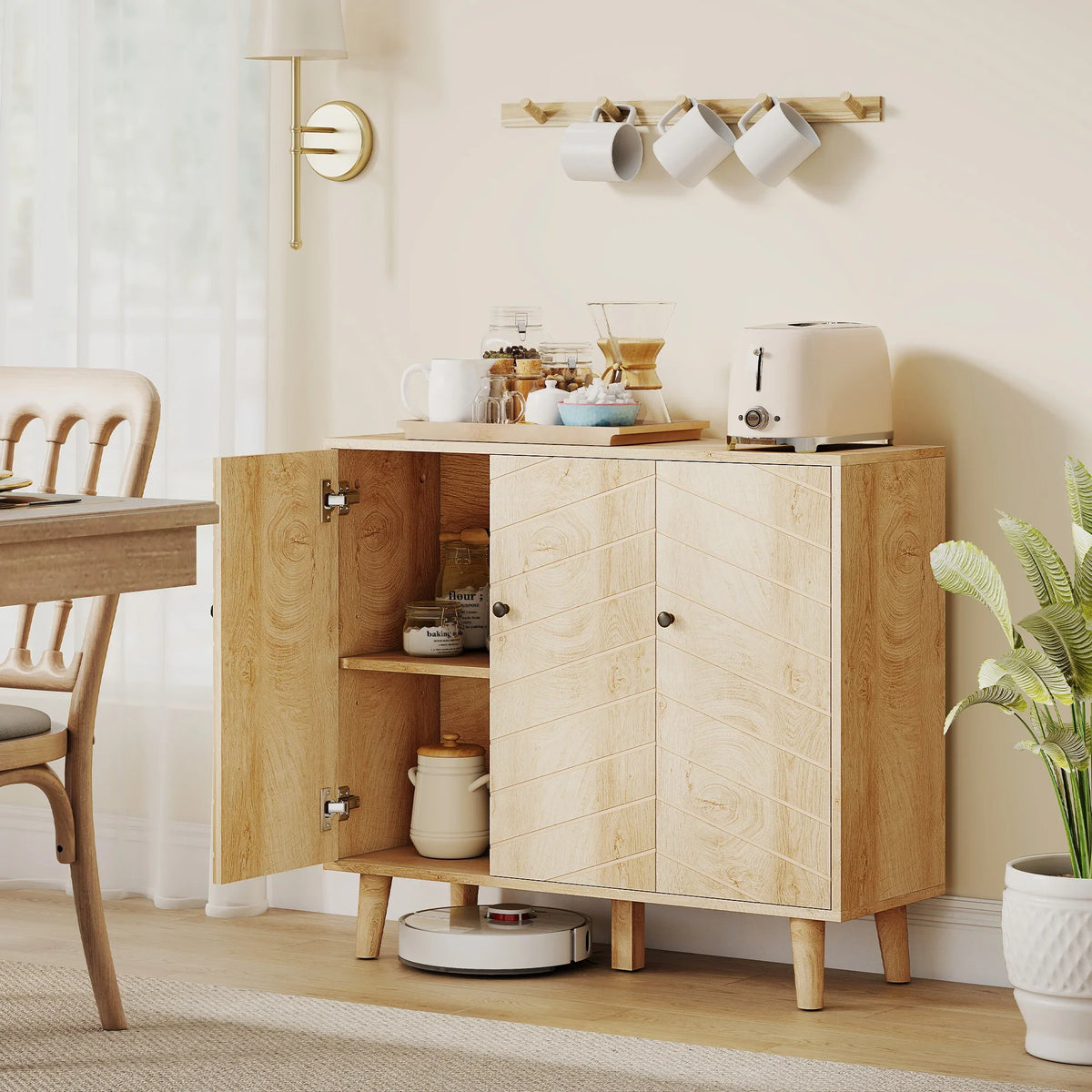 Wooden sideboard with chevron-pattern doors, open shelves, and round black hardware
